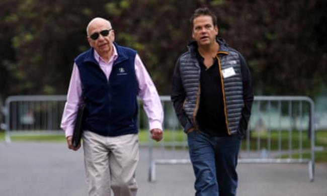 Rupert and Lachlan Murdoch walking side by side