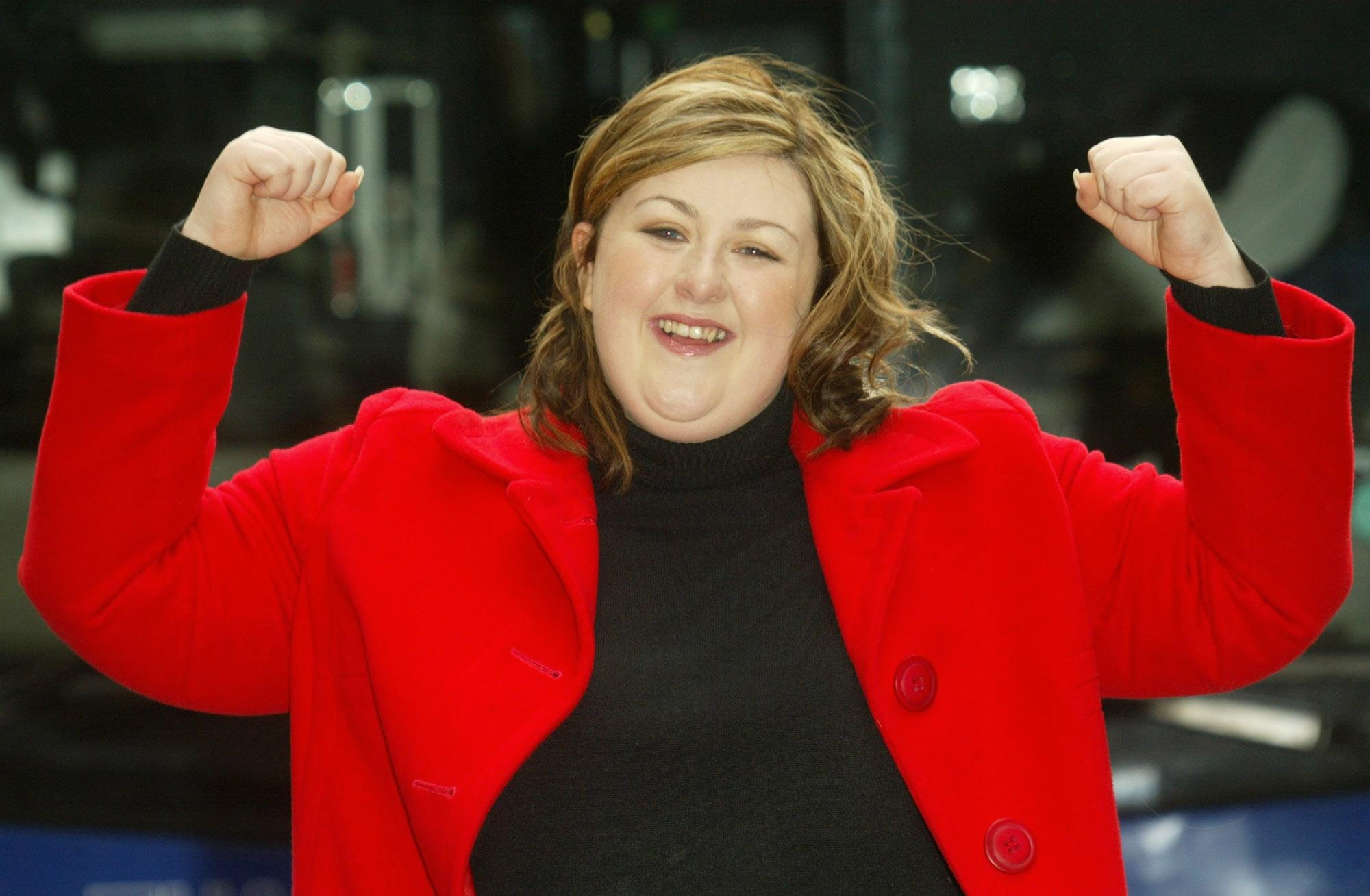 Pop Idol winner Michelle McManus raising her arms and smiling
